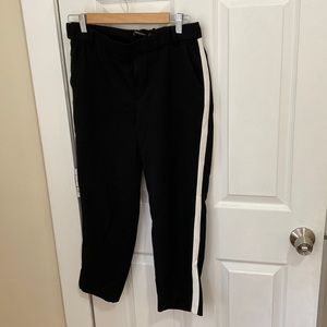 Ankle length pants. Black with white stripe